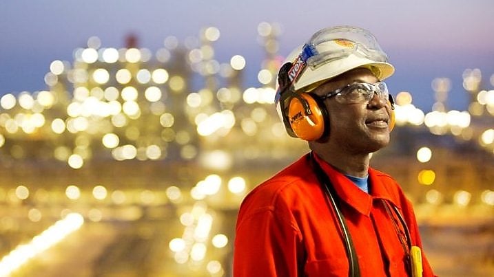 Employee in safety uniform at Pearl GTL