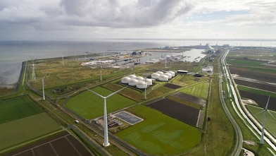 Windmills on field