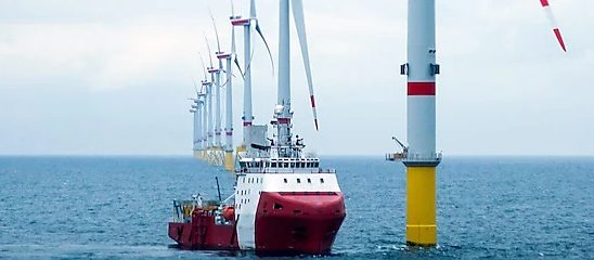 Offshore Support Vessel using biodegradable lubricants, VGP compliant and EU Ecolabel, whilst docking at an offshore wind turbine