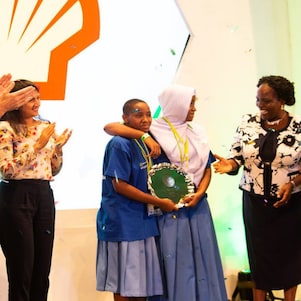 The Minister for Education, Science, Technology and Vocational Training (second from right) congratulating the YST winners for 2018