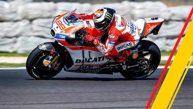 Ducati superbike and rider racing around a track corner