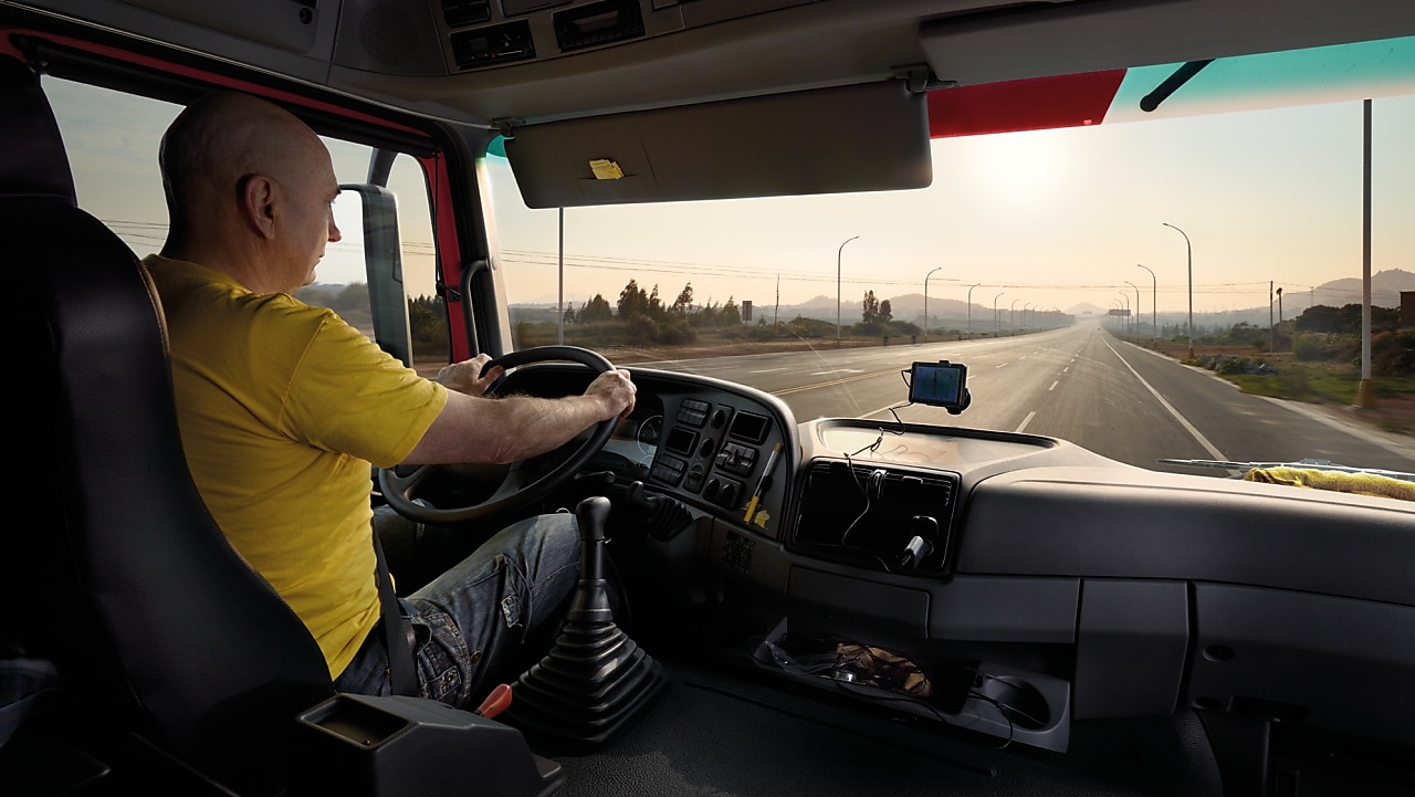 truck driver driving on empty road