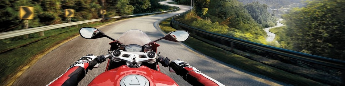 Man riding a bike which is using the Superior Engine Oil For Bikes