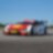 A red and white BMW race car sits on the track, exemplifying the Shell Helix Ultra and BMW’s Premium Technology Partnership