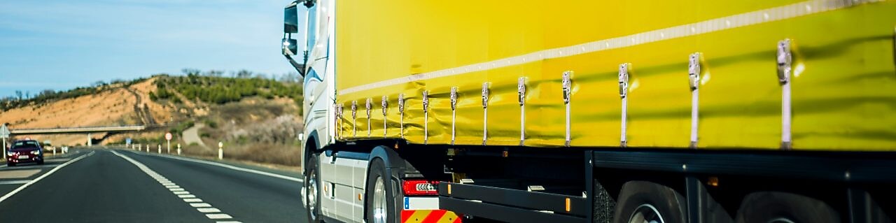 Yellow truck on the road