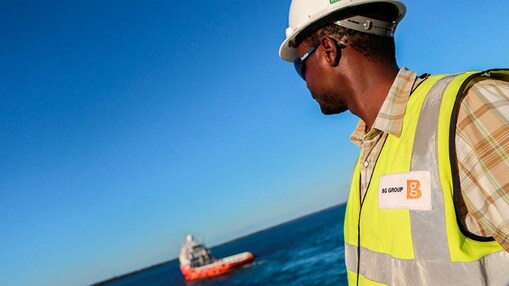 Man looking at ship